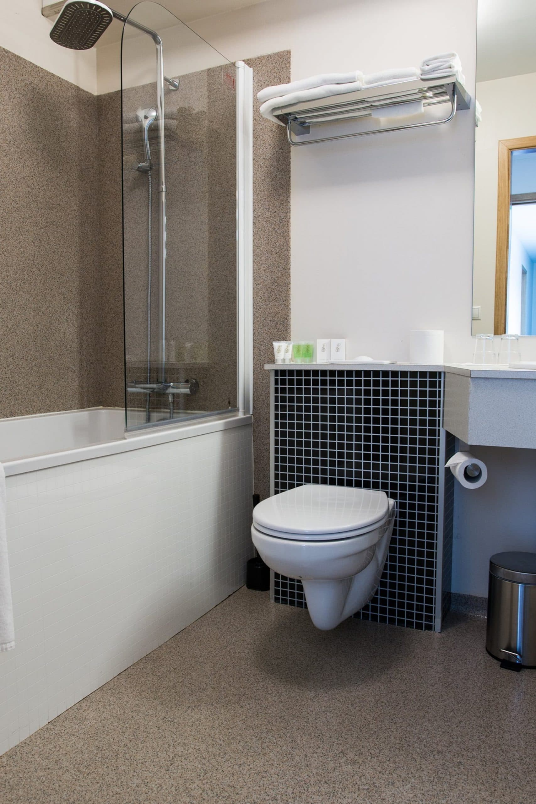 Bathroom with a bathtub and a shower