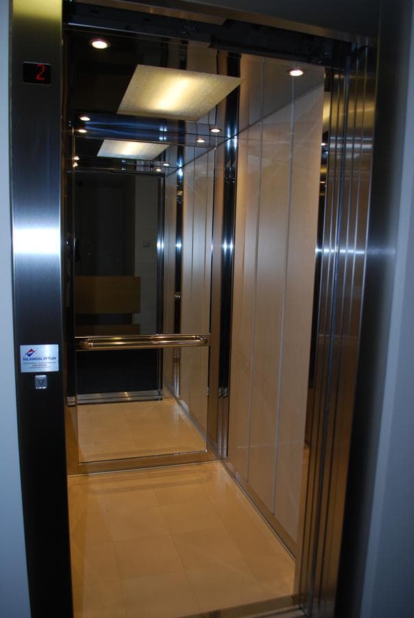 The hotel elevator with its doors open