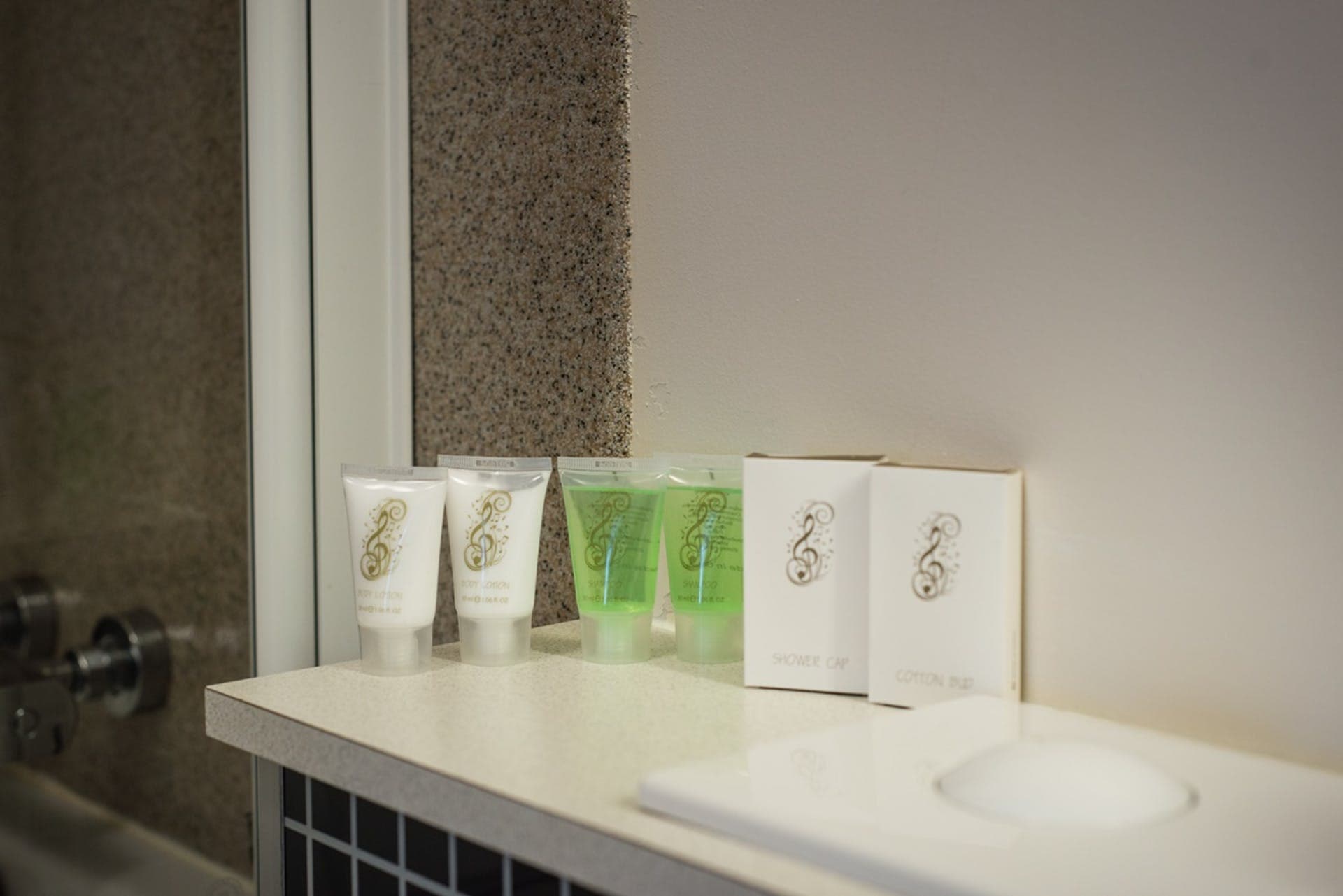 Hotel Jazz toiletries on the bathroom counter